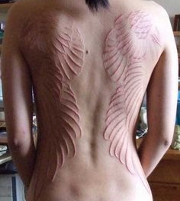 10+ Pretty Scarification Tattoo Designs for Women