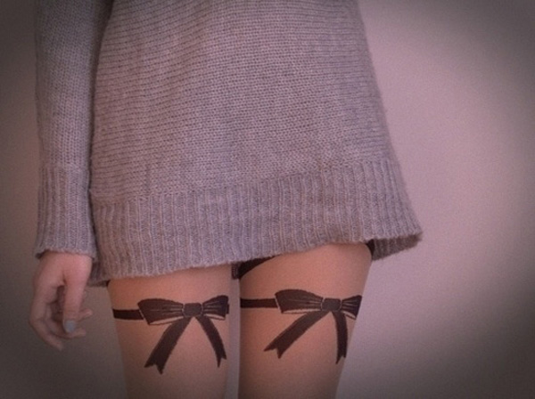 Ribbon Tattoos for girl on the both leg