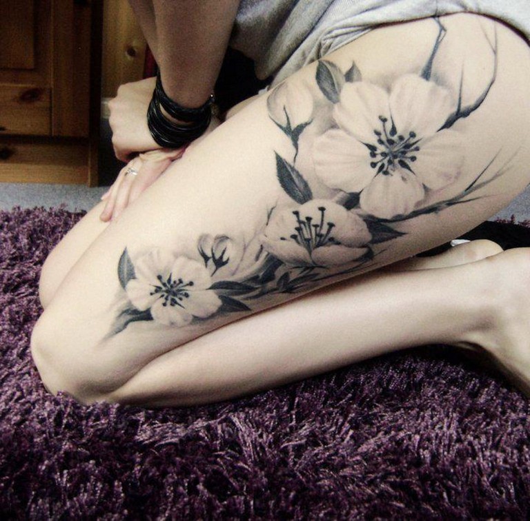 Stimulating Thigh Tattoos 17