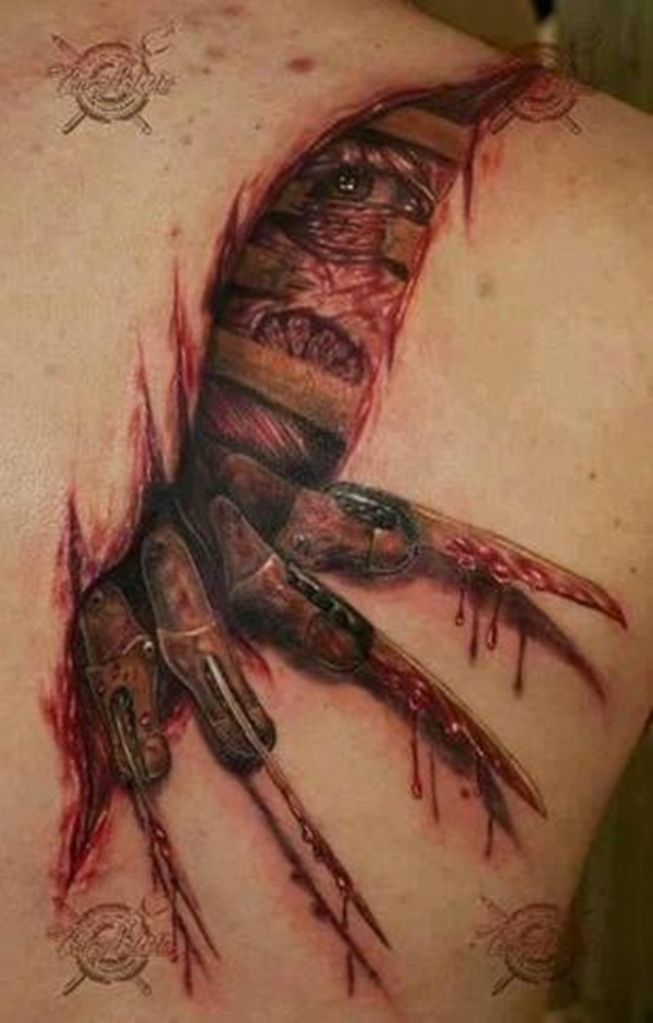 Ripped Skin Tattoo Design and Ideas 27