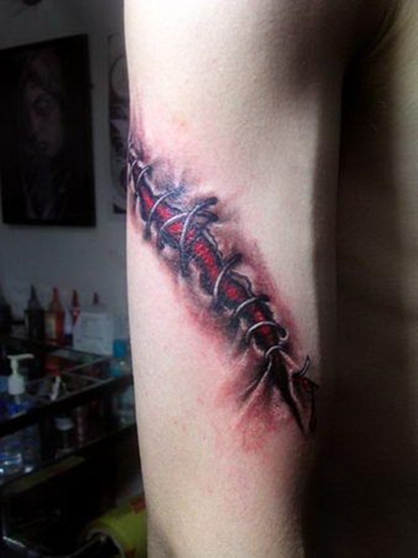 Ripped Skin Tattoo Design and Ideas 8