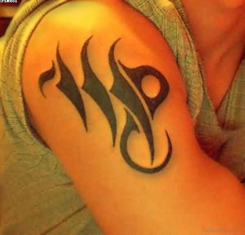 Zodiac shoulder tattoo