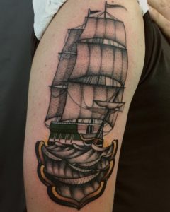 traditional style ship tattoo al boy