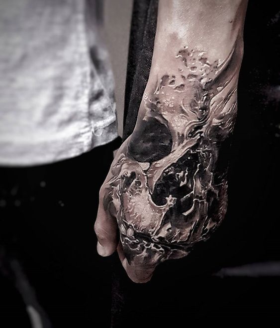 Decaying Skull Hand Tattoo