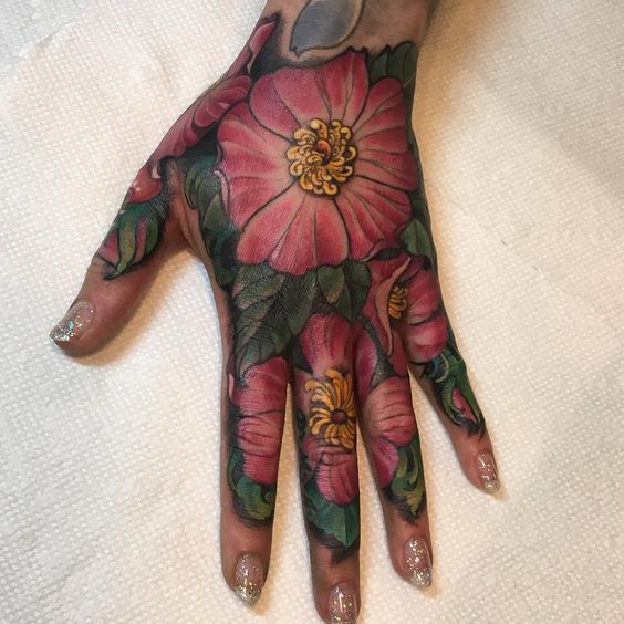Wild Roses Hand Tattoo