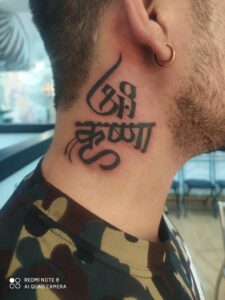 Krishna Tattoo on Neck