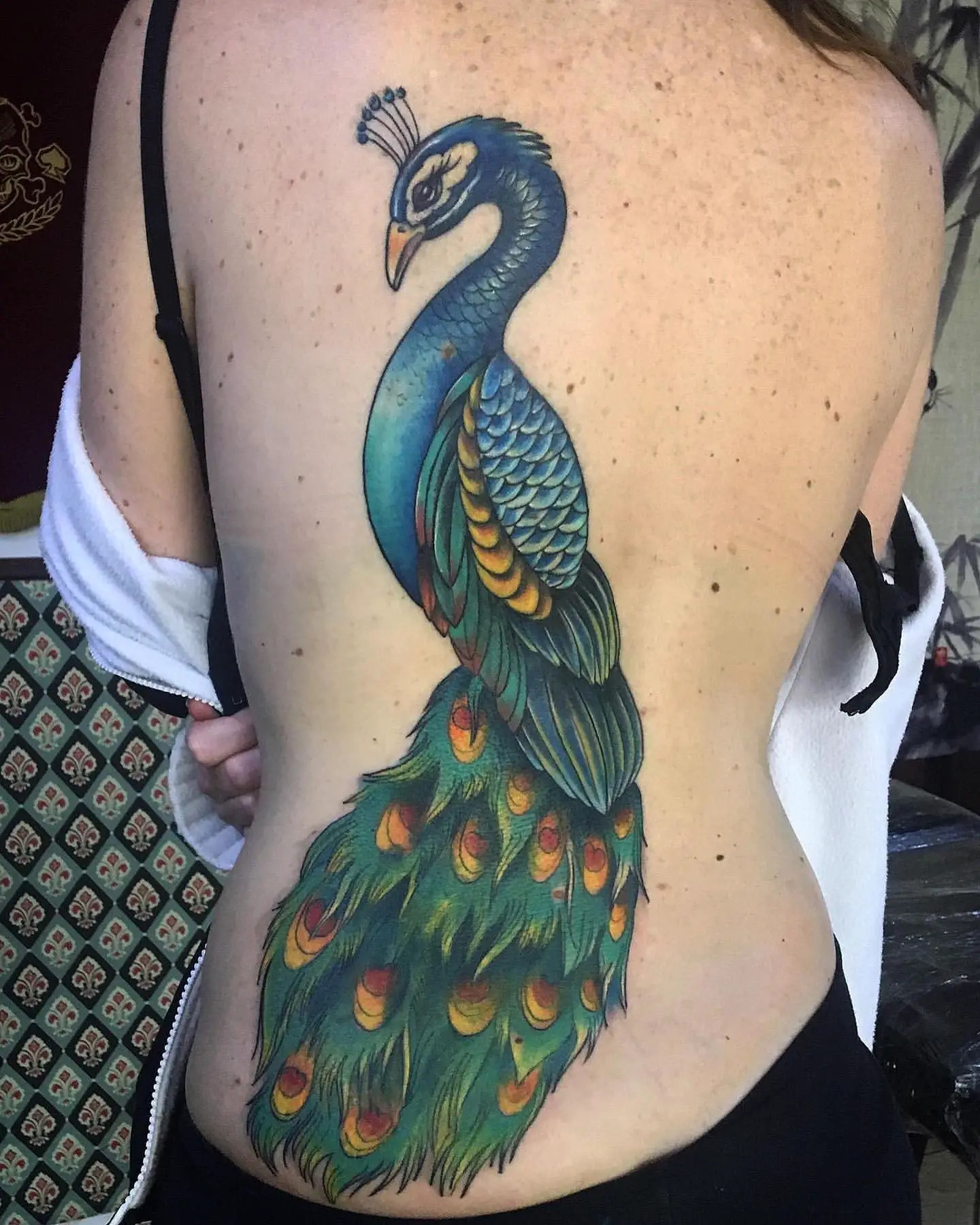 Simple Peacock Tattoo - Tattoos Era