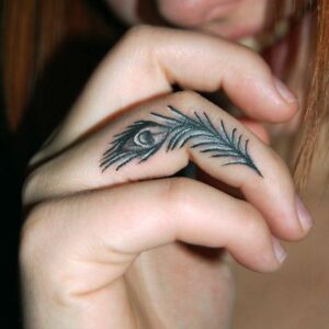 Peacock Feather Finger Tattoo